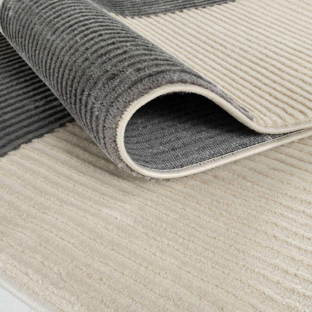 Stride Grey rug Geometric design non-shedding, and underfloor heating–friendly—ideal for busy homes.