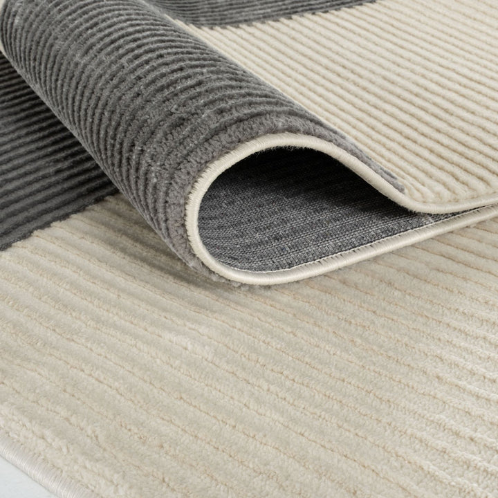 Stride Grey rug Geometric design non-shedding, and underfloor heating–friendly—ideal for busy homes.
