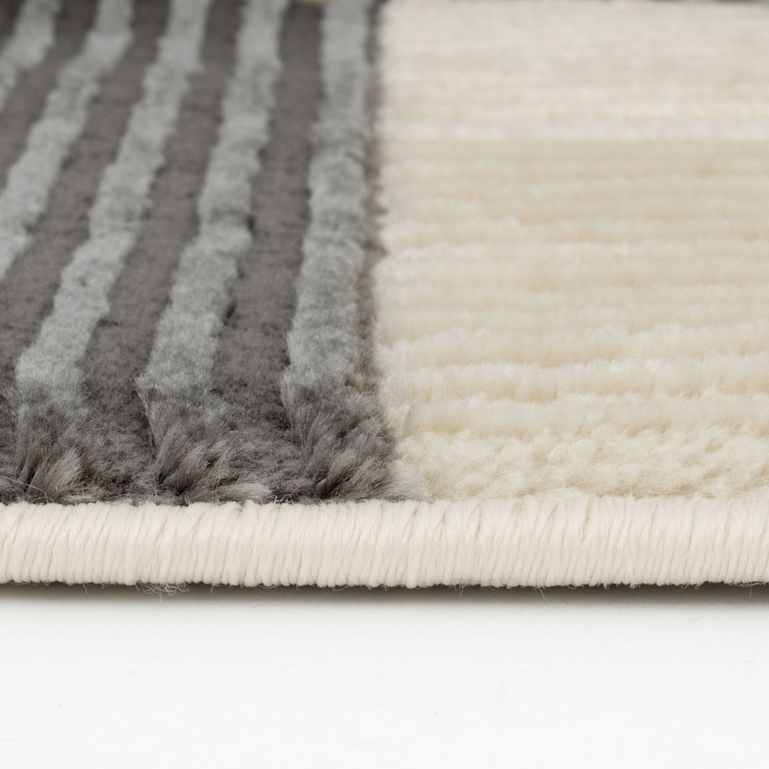 Stride Grey rug Geometric design non-shedding, and underfloor heating–friendly—ideal for busy homes.