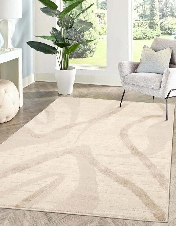 Ava Pave Wave Illusion Rug in cream with abstract design, enhancing modern interior decor.