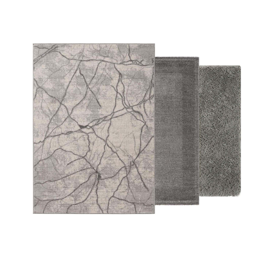 Three stylish area rugs in gray, featuring a marble pattern, plush texture, and modern design for home decor.