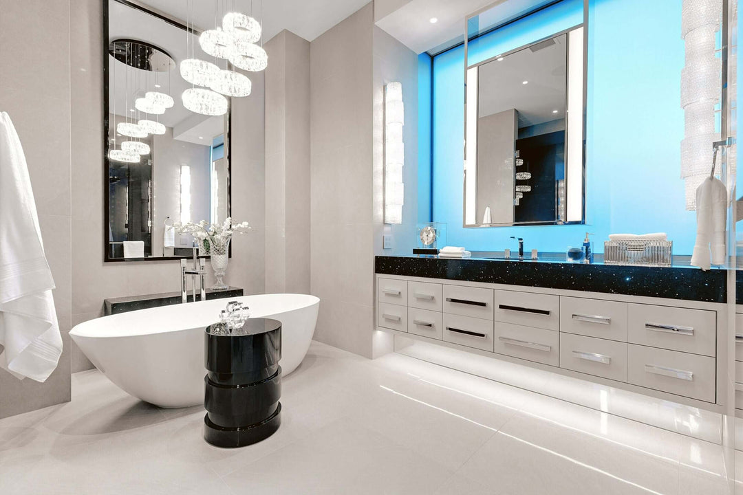 Modern luxury bathroom design featuring a freestanding tub, elegant fixtures, and sleek blue accents.