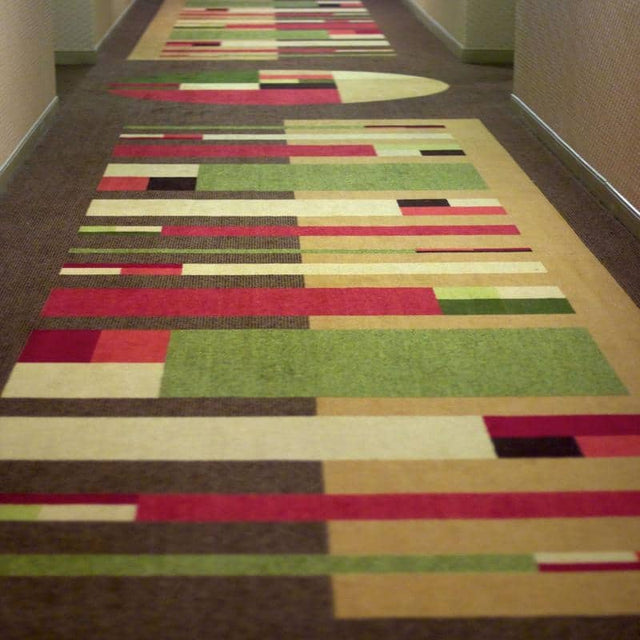 Green rug styled with home decor accents