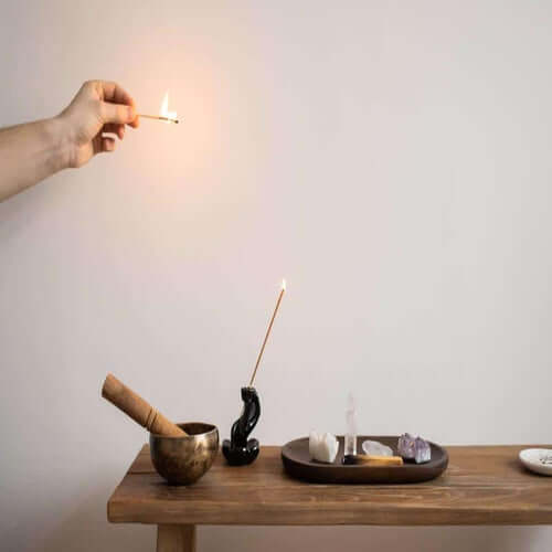 Rug styled with candles for a cosy autumn atmosphere