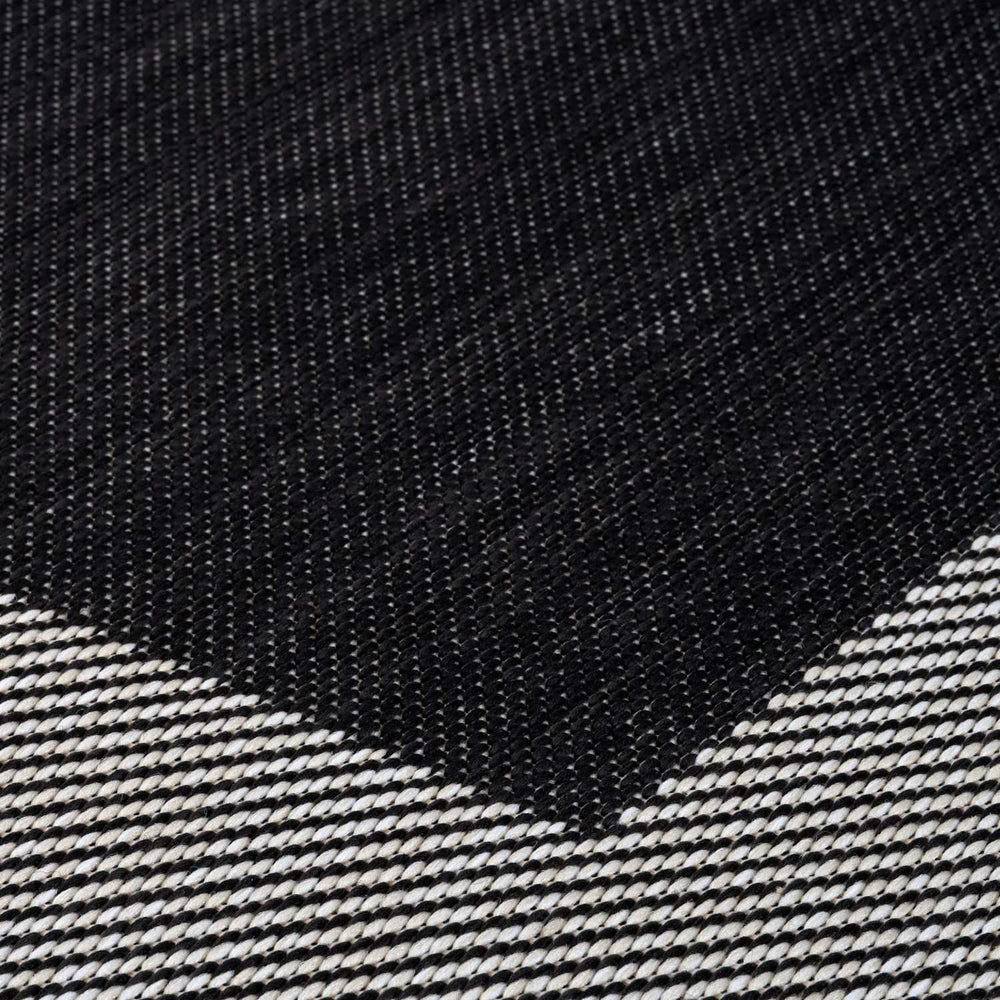 Outdoor Black Bordered Rug Weather resistant, Durable.