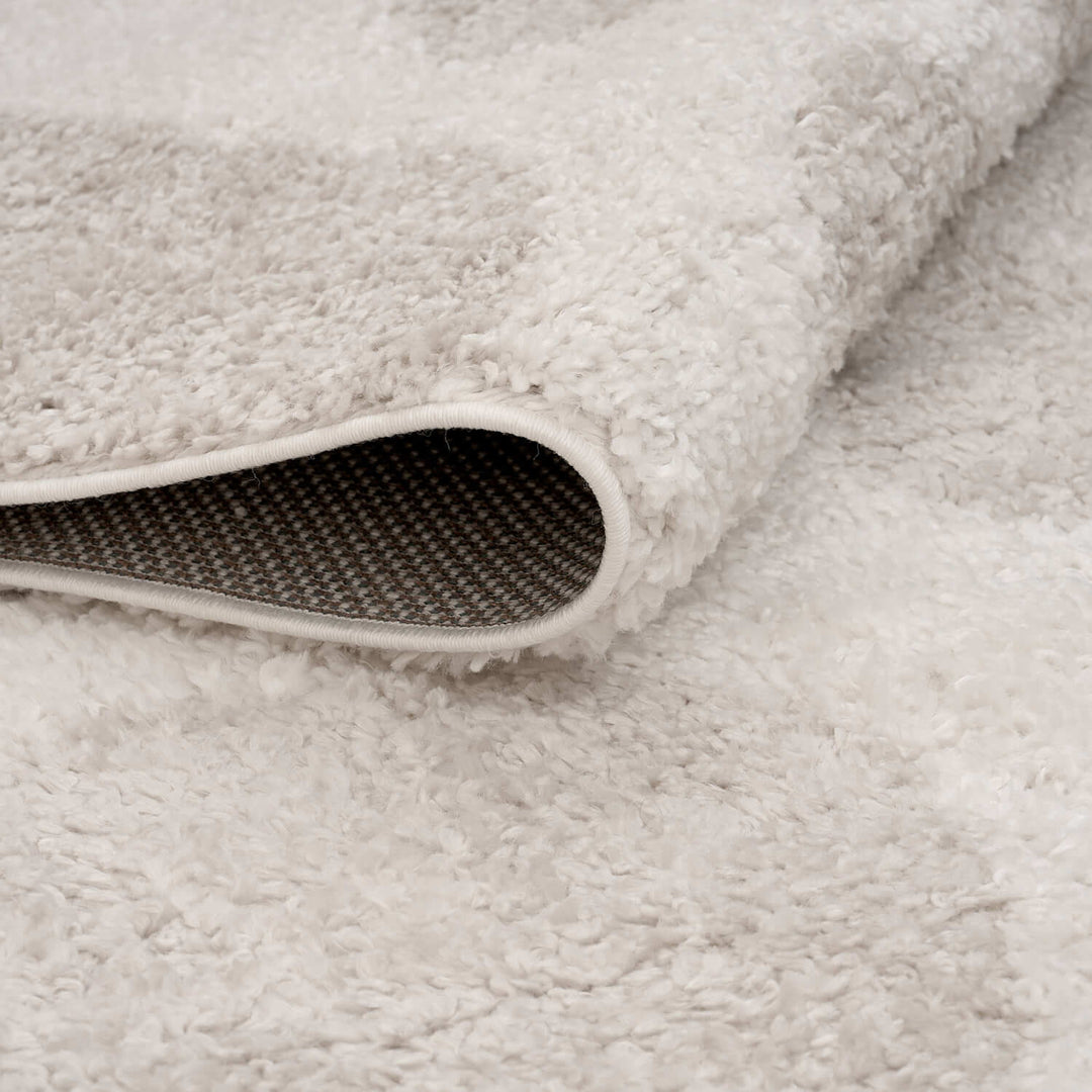 Moodi Shaggy Cream Rug, abstract design, soft underfoot feel | THE RUGS