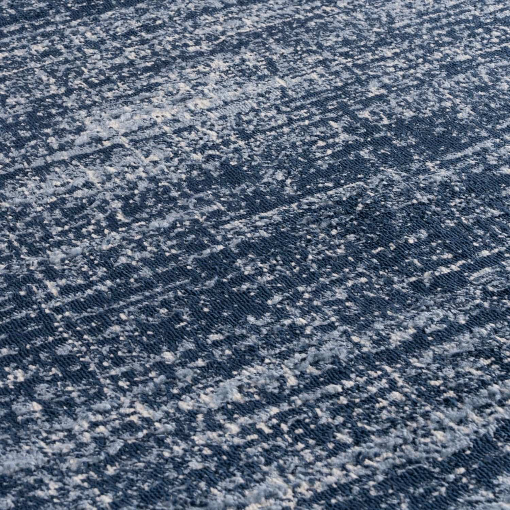 Blue colour rug, Non-shedding, stain-resistant, and pet-friendly.