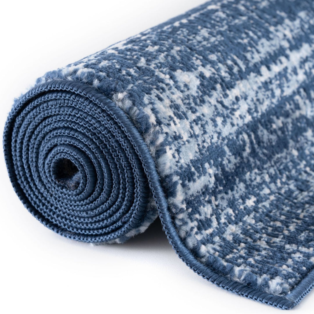Blue colour rug, Non-shedding, stain-resistant, and pet-friendly.