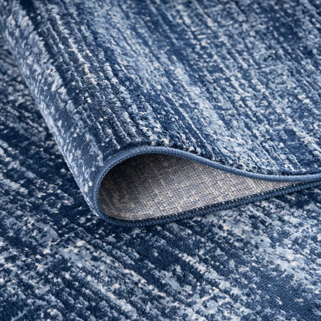 Blue colour rug, Non-shedding, stain-resistant, and pet-friendly.