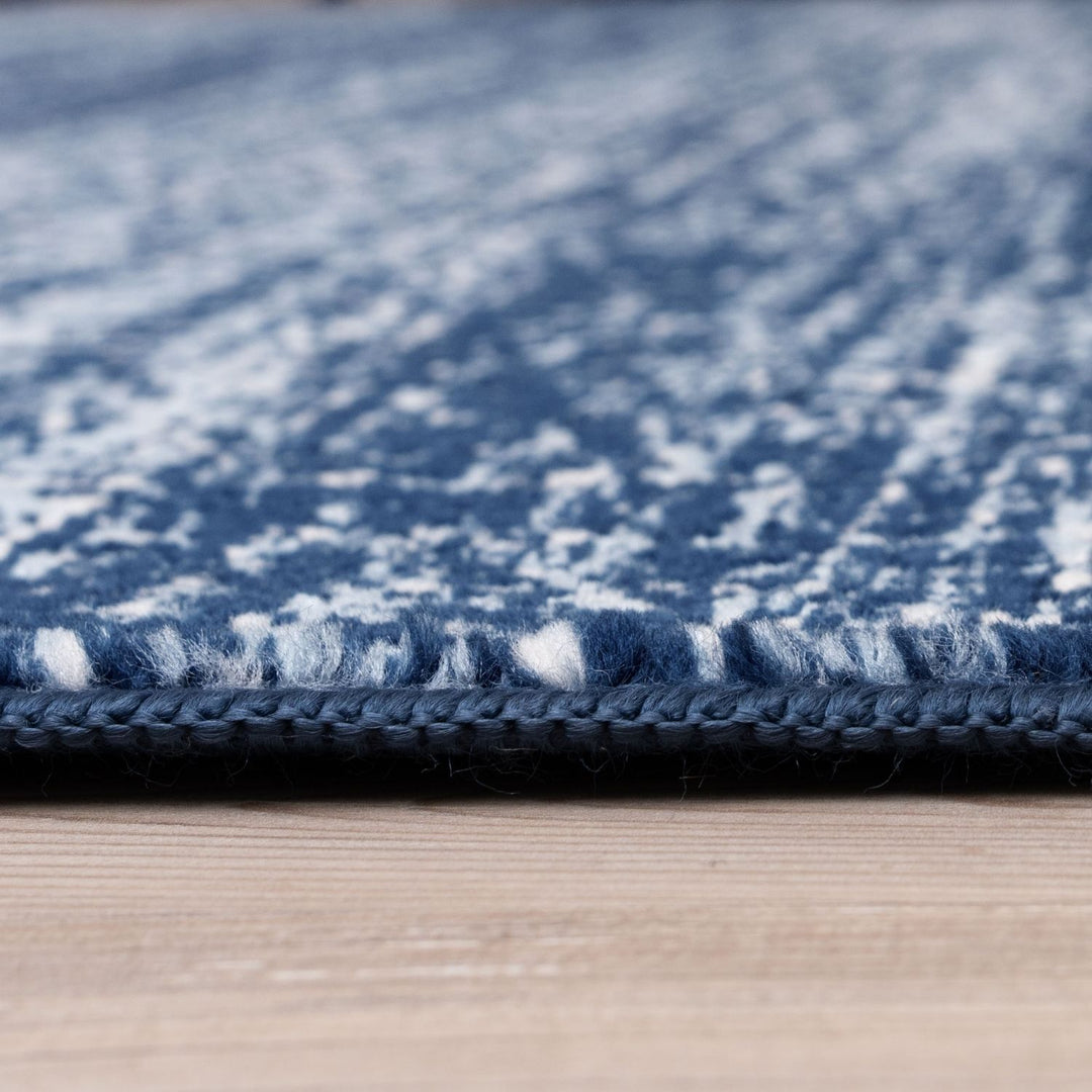 Blue colour rug, Non-shedding, stain-resistant, and pet-friendly.