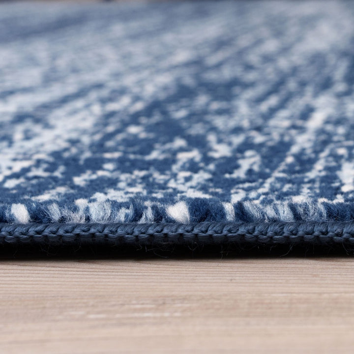 Blue colour rug, Non-shedding, stain-resistant, and pet-friendly.
