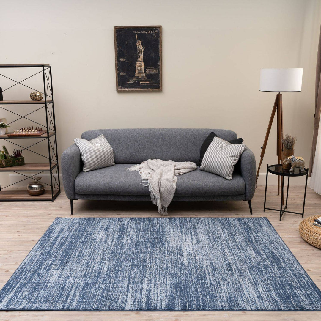 Blue colour rug, Non-shedding, stain-resistant, and pet-friendly.