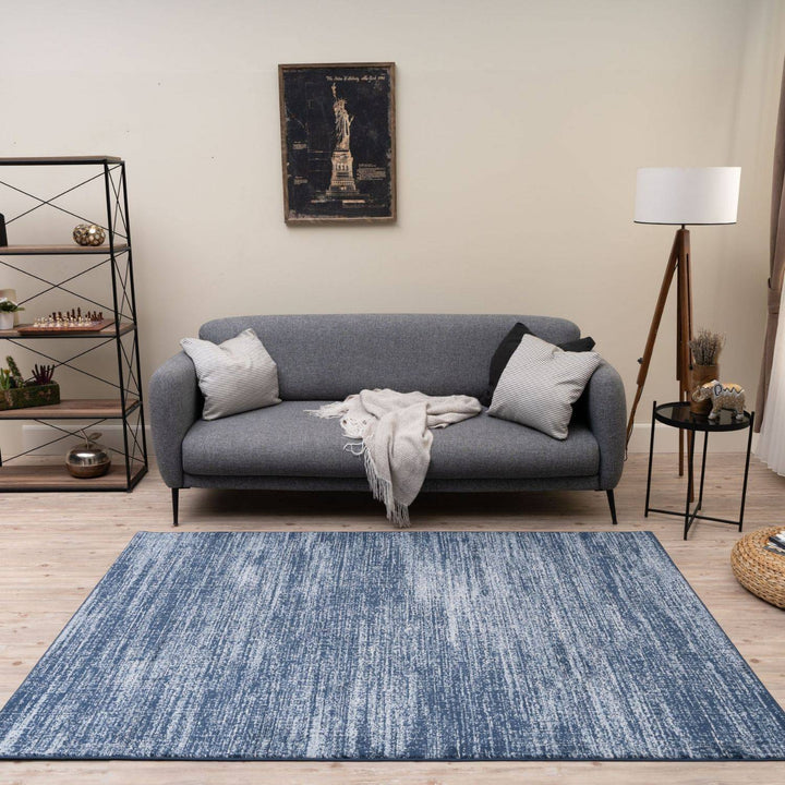 Blue colour rug, Non-shedding, stain-resistant, and pet-friendly.