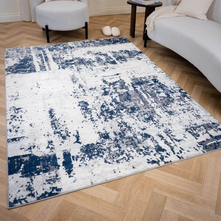 Elaris navy abstract rug, jute backing, anti-static, non-shedding | The Rugs