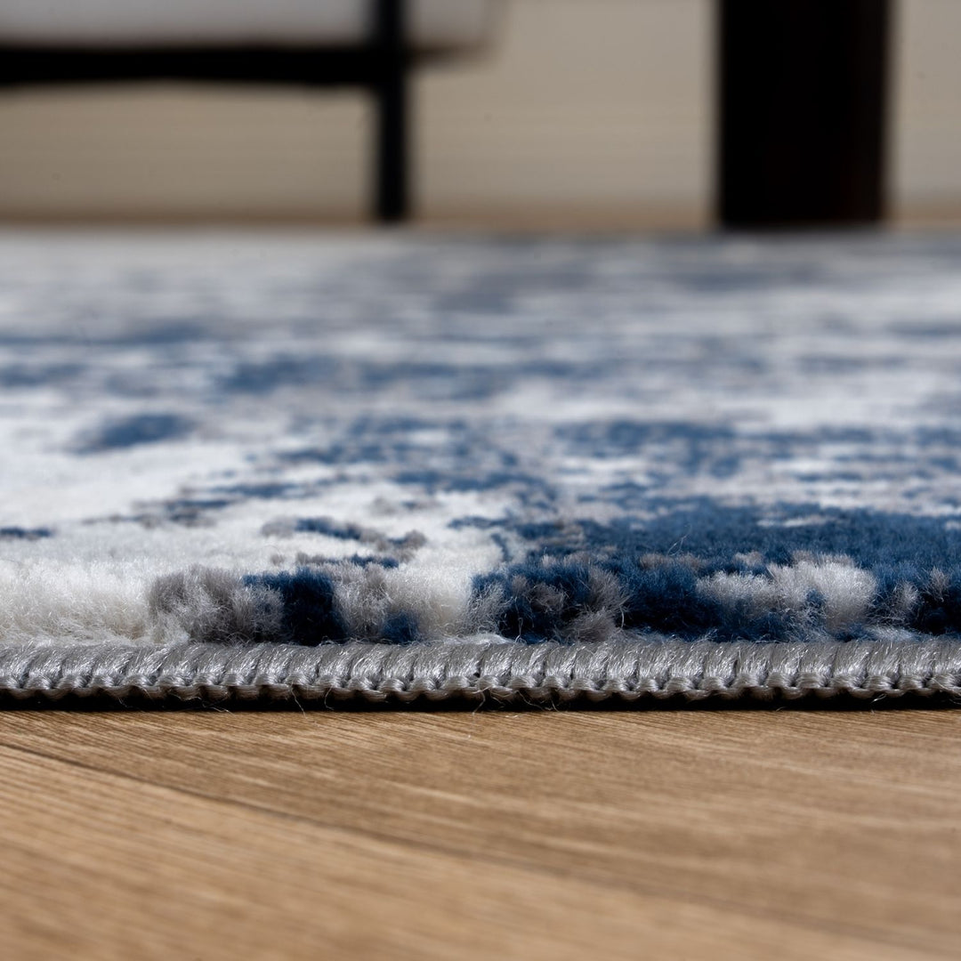 Elaris navy abstract rug, jute backing, anti-static, non-shedding | The Rugs