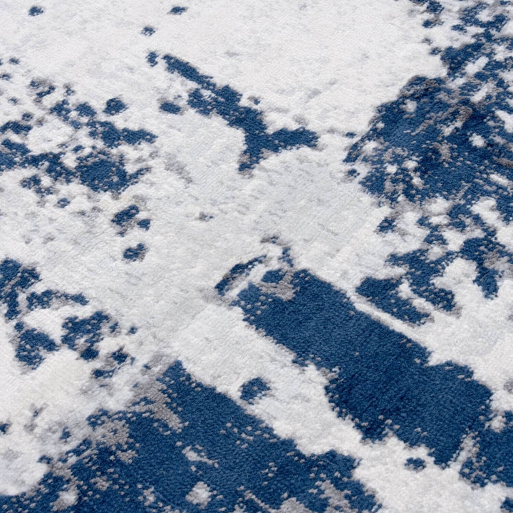 Elaris navy abstract rug, jute backing, anti-static, non-shedding | The Rugs