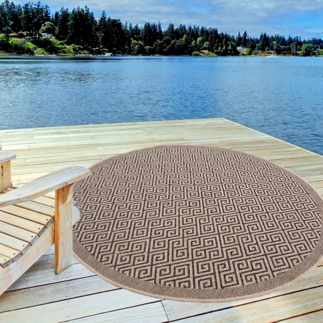 Nature Outdoor Rug Dark Grey jute-look designs and soft, non-shedding texture, moisture and UV protected.