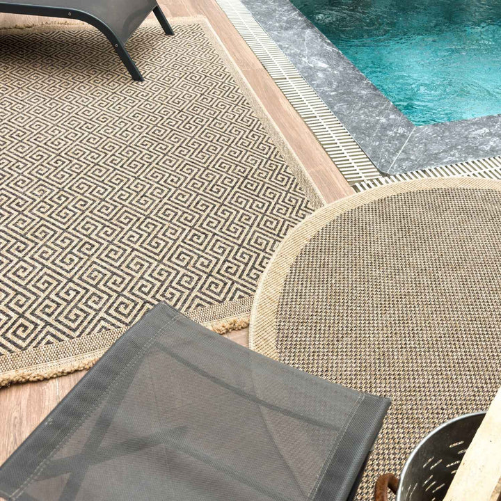 Nature Outdoor Rug Dark Grey jute-look designs and soft, non-shedding texture, moisture and UV protected.