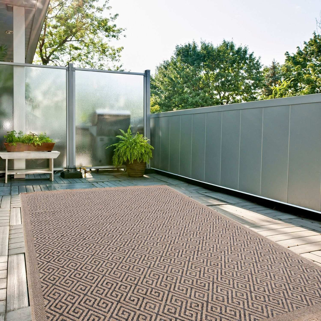 Nature Outdoor Rug Dark Grey jute-look designs and soft, non-shedding texture, moisture and UV protected.