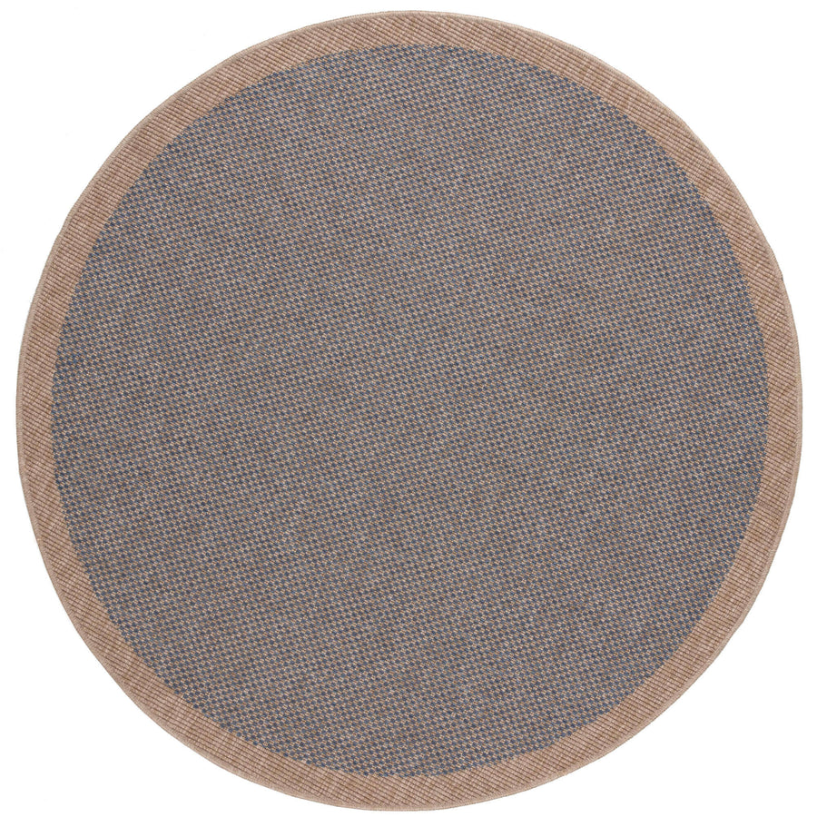 Blue circular outdoor rug made from durable polypropylene, ideal for patios and gardens, easy to clean and UV protected.