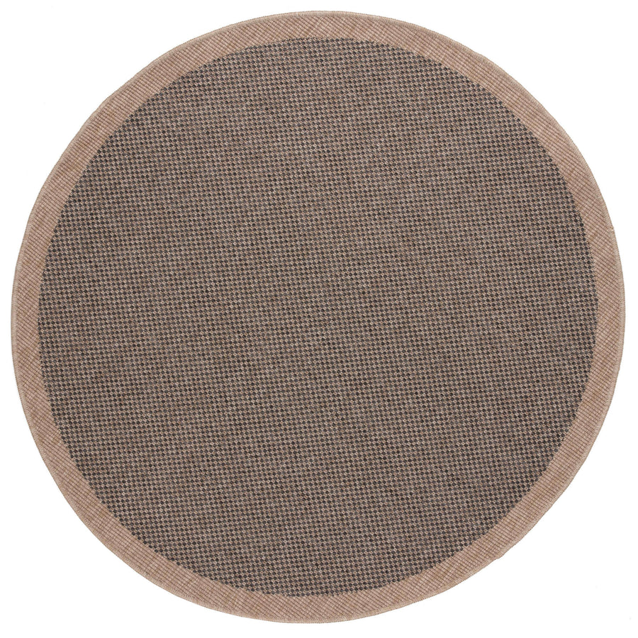 Round dark grey outdoor rug made of durable polypropylene for patio or garden, UV protected and moisture-resistant.