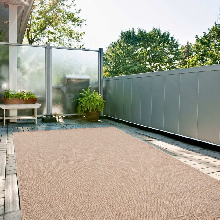 Nature Outdoor beige rug is resistant to moisture and UV protected