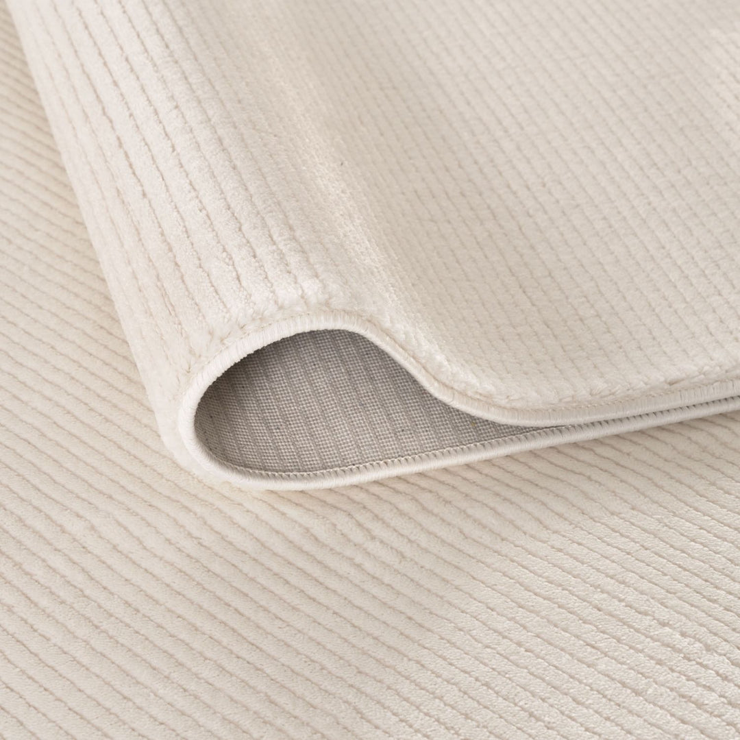 cream colour, striped design, stain-resistant, Cosy comfort rug.