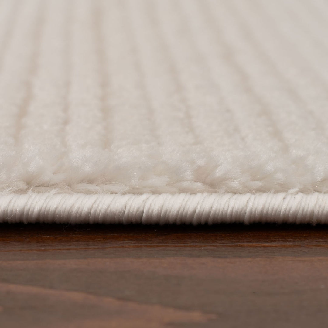 cream colour, striped design, stain-resistant, Cosy comfort rug.