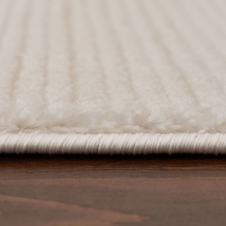 cream colour, striped design, stain-resistant, Cosy comfort rug.