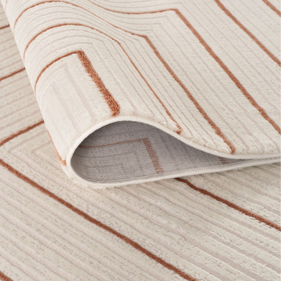Living Room, perfect mix of clean design, lasting comfort, terra-cream rug.