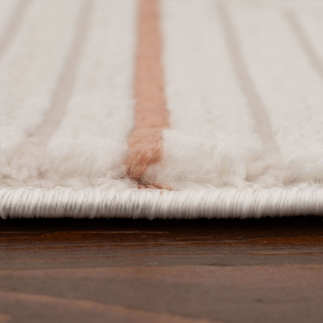 Living Room, perfect mix of clean design, lasting comfort, terra-cream rug.