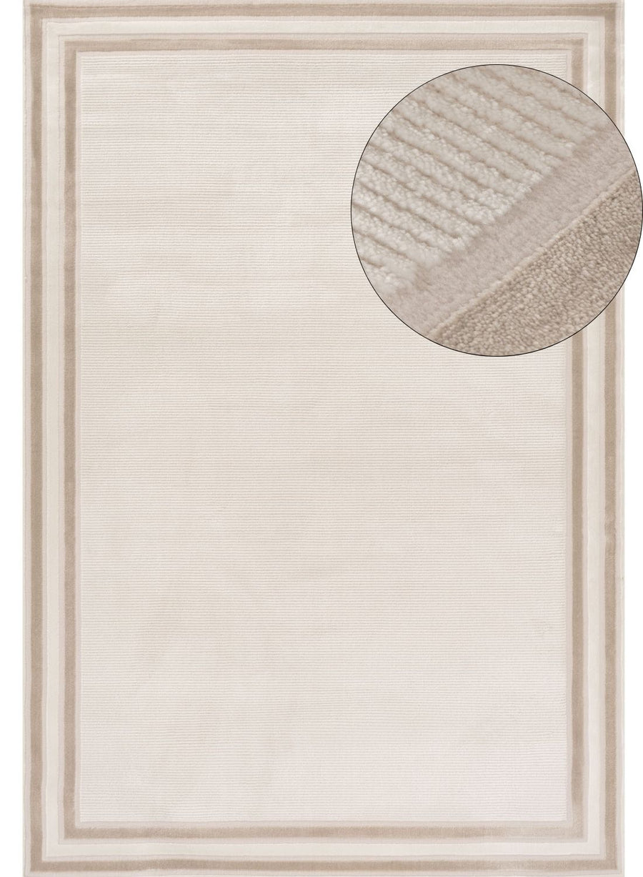 Beige rug with a circular detail showing texture