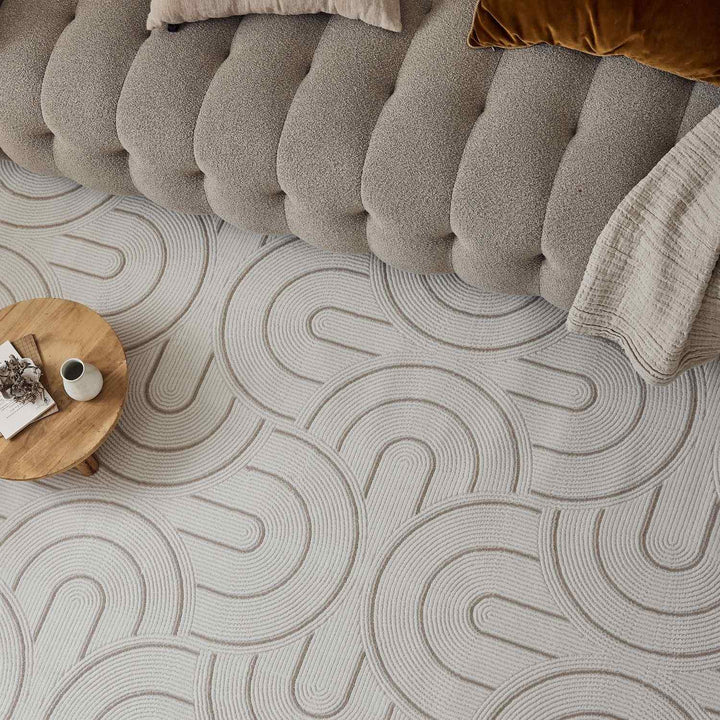Living Room rug, beige-cream colours, geometric, practicality in mind, the rug is anti-allergic.