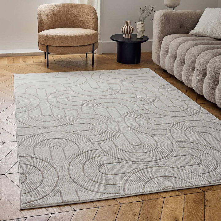 Living Room rug, beige-cream colours, geometric, practicality in mind, the rug is anti-allergic.