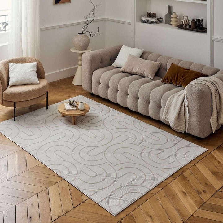 Living Room rug, beige-cream colours, geometric, practicality in mind, the rug is anti-allergic.