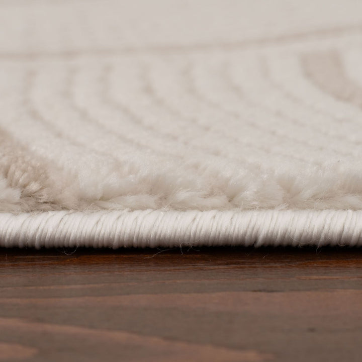 Living Room rug, beige-cream colours, geometric, practicality in mind, the rug is anti-allergic.