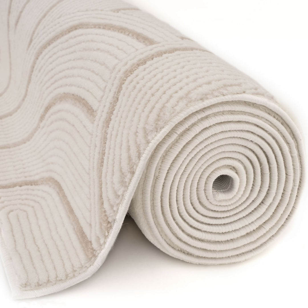 Living Room rug, beige-cream colours, geometric, practicality in mind, the rug is anti-allergic.
