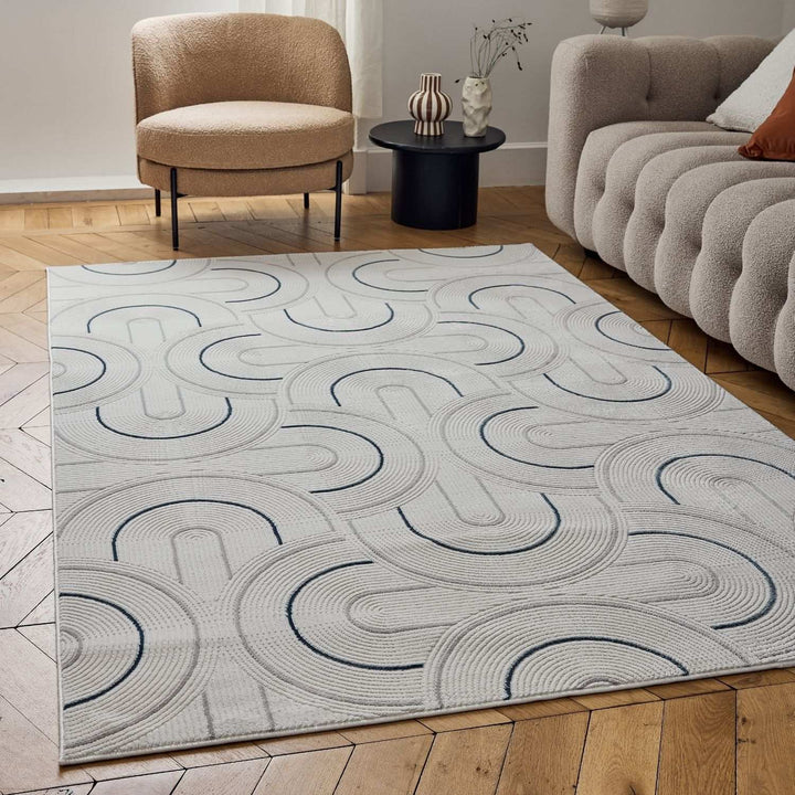 Living Room rug, blue-cream colours, geometric, practicality in mind, the rug is anti-allergic.