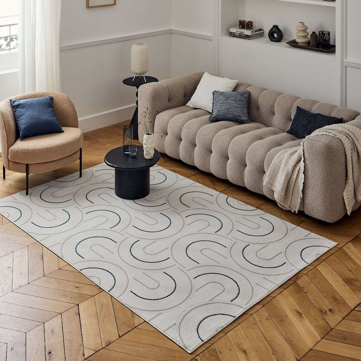 Living Room rug, blue-cream colours, geometric, practicality in mind, the rug is anti-allergic.
