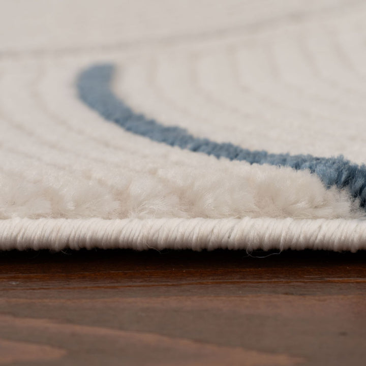Living Room rug, blue-cream colours, geometric, practicality in mind, the rug is anti-allergic.