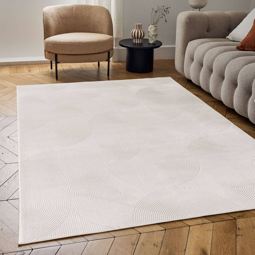 Living Room rug, cream colours, geometric, practicality in mind, the rug is anti-allergic.