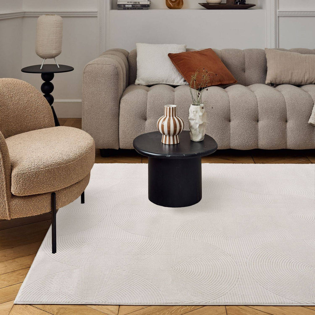 Living Room rug, cream colours, geometric, practicality in mind, the rug is anti-allergic.
