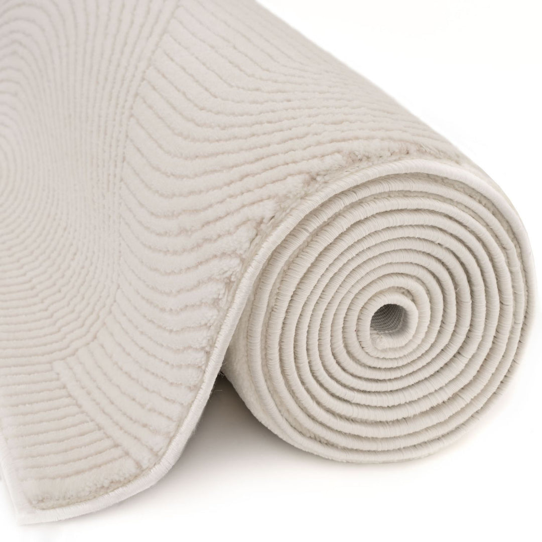 Living Room rug, cream colours, geometric, practicality in mind, the rug is anti-allergic.