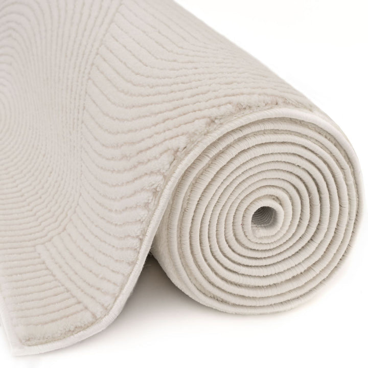 Living Room rug, cream colours, geometric, practicality in mind, the rug is anti-allergic.