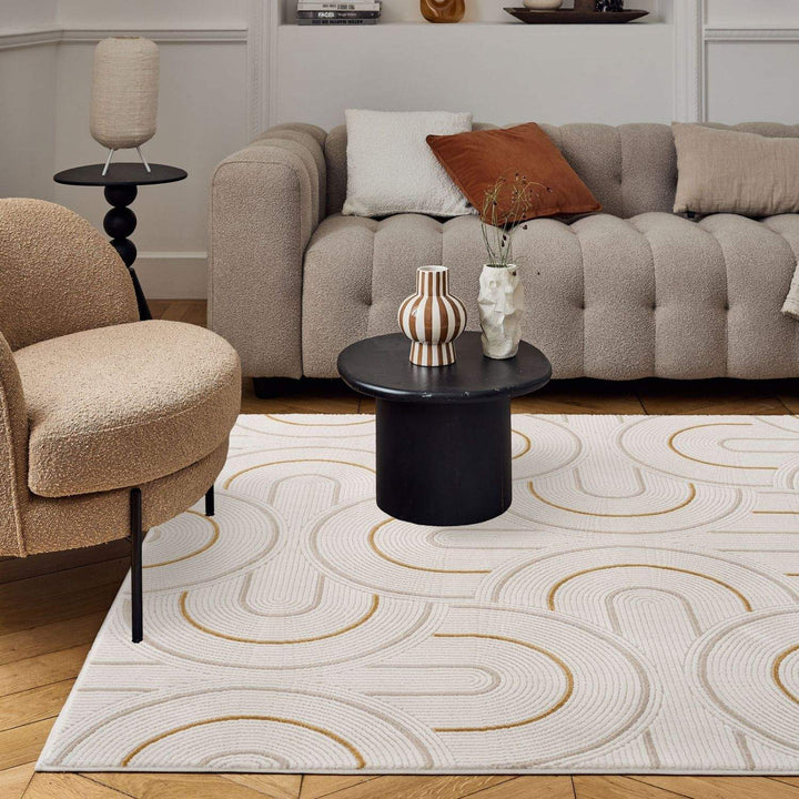 Living Room rug, gold-cream colours, geometric, practicality in mind, the rug is anti-allergic.