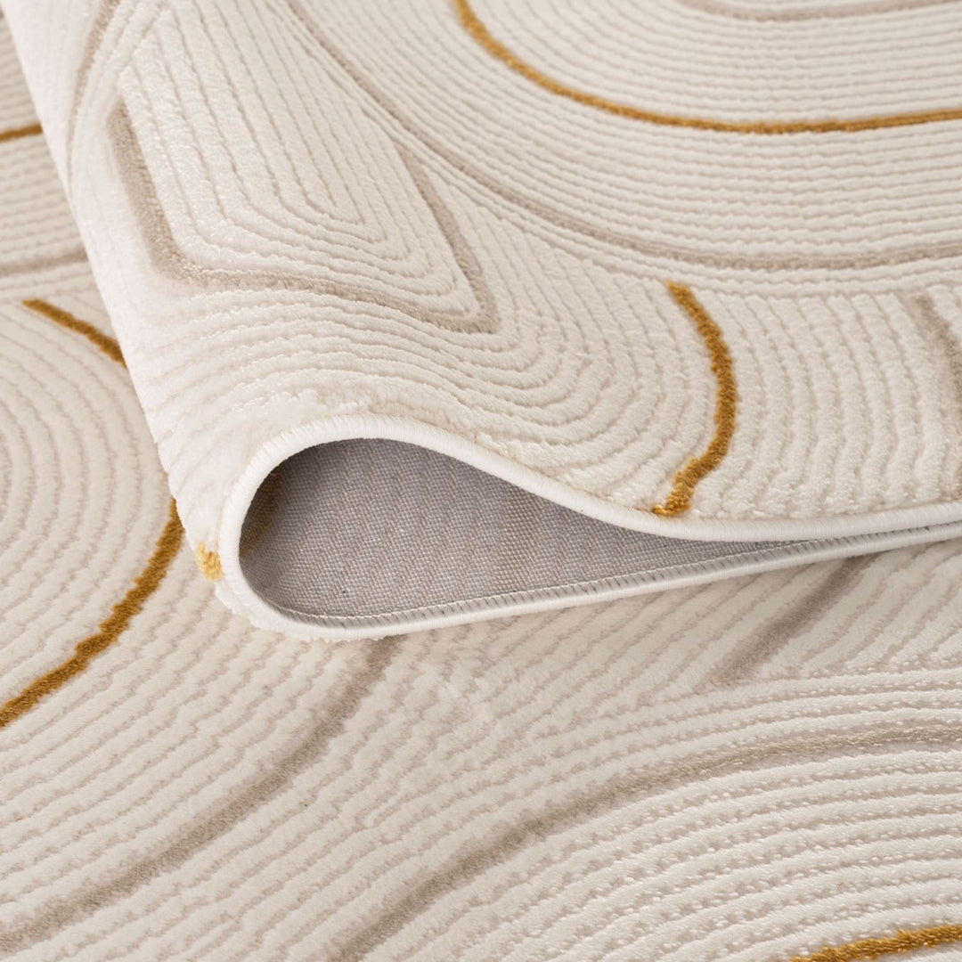 Living Room rug, gold-cream colours, geometric, practicality in mind, the rug is anti-allergic.