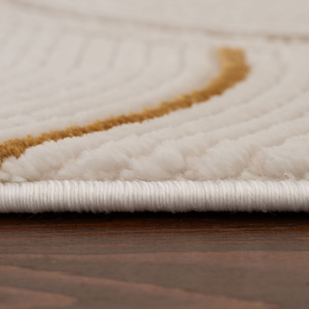 Living Room rug, gold-cream colours, geometric, practicality in mind, the rug is anti-allergic.