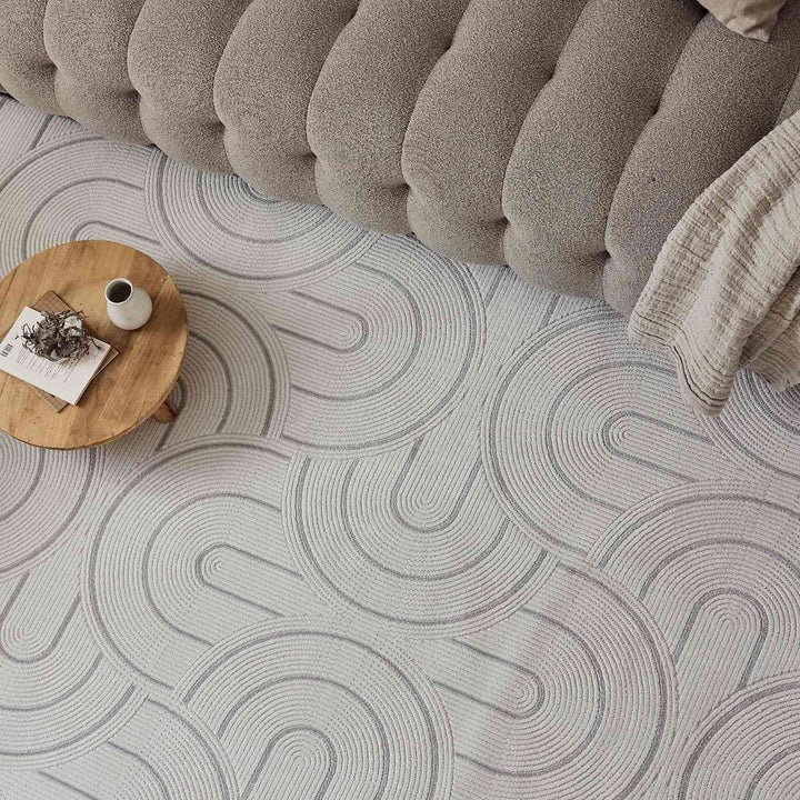 Living Room rug, grey-cream colours, geometric, practicality in mind, the rug is anti-allergic.