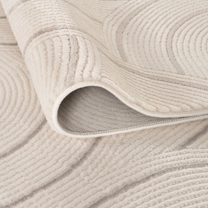 Living Room rug, grey-cream colours, geometric, practicality in mind, the rug is anti-allergic.