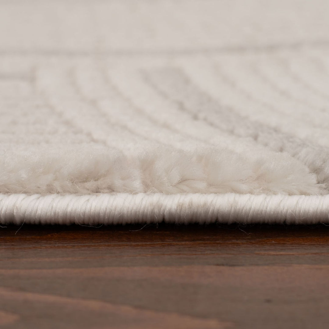 Living Room rug, grey-cream colours, geometric, practicality in mind, the rug is anti-allergic.